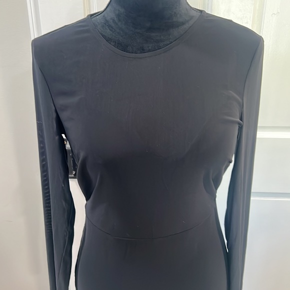 ⭐️SOLD⭐️ Bebe s black dress w/built-in bra,sheer sleeves, and open back. - Picture 5 of 8